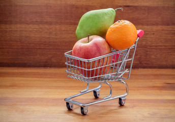 shopping cart filled with fresh fruit