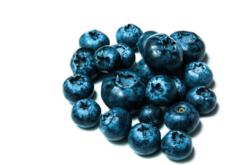 Fresh great bilberries or blueberries isolated on white
