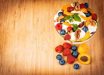 Naklejka na ściany i meble Dessert with yogurt and fresh berries. Dietary breakfast.