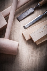 Wooden building boards hammers flat chisels on wood background c