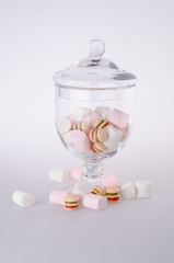 Candies. colorful candies in glass jar on background