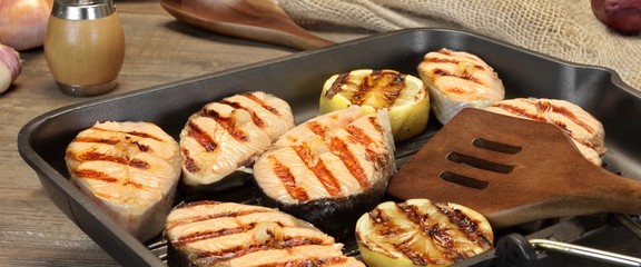 Still Life With Grilled Salmon Steaks In Rustic Style
