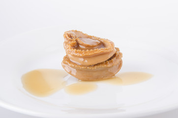 Abalones. Chinese cuisine abalone on background.