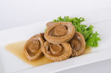Abalones. Chinese cuisine abalone on background.