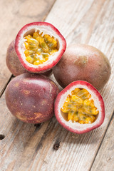 Passion fruits on wood background.