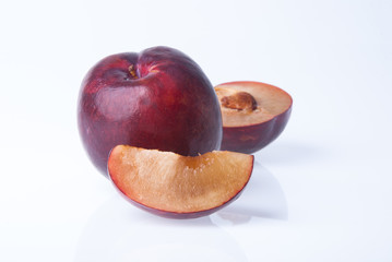 Plum. Ripe plum fruit on background