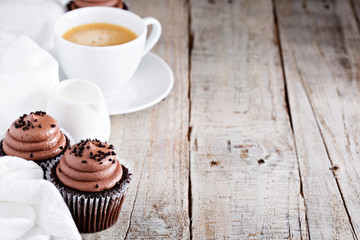Chocolate cupcakes with a cup of coffee