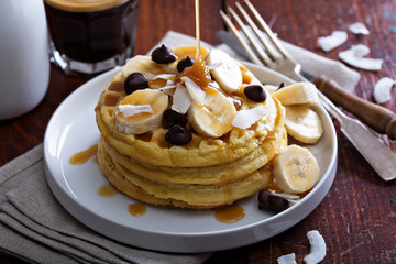 Waffles with banana slices and chocolate