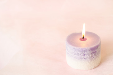 Fototapeta na wymiar Romantic background - Aroma candle with vintage color