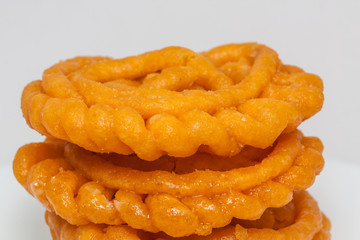Indian Jalebi in a white plate. Jalebi is one of kerala's favorite dessert
