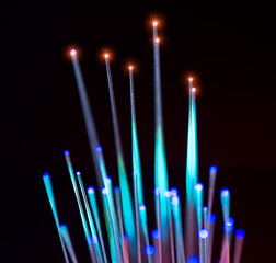 optical fibres dinamic flying from deep on technology background