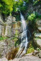 mountain waterfall landscape long exposure photo, blurred. Georgia
