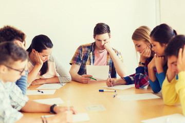group of students with papers