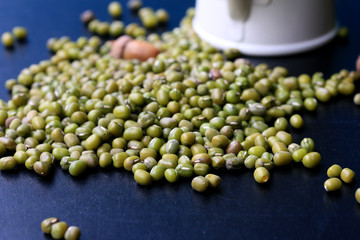 green beans dried on black background