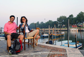 young married couple visiting the island of Burano in the early
