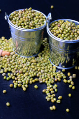 green beans dried on black background