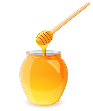 A jar of honey and spoon for honey