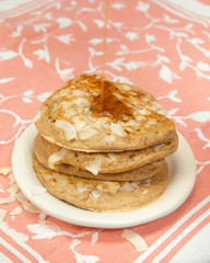 Whole Grain Coconut Pancakes with Maple Syrup