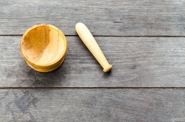 wood mortar on wood background