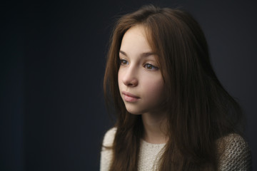 Naklejka premium young beautiful girl studio portrait