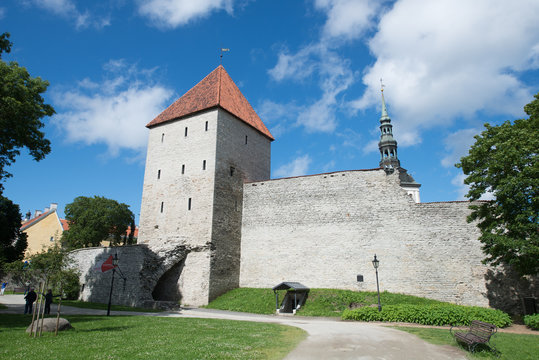 View of fortress towers and church on sky background. Tallinn. Estonia