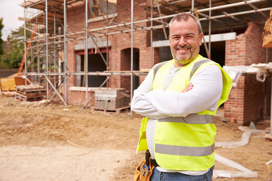 Portrait Of Construction Worker On Building Site