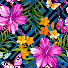 Tropical floral seamless pattern with butterflies. Hibiscus and palm leaves on geometric background