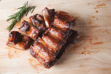 grilled pork rib on wooden board