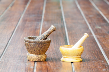 wood mortar on wood background