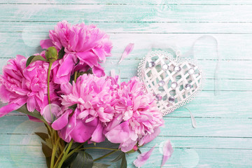 Peony flowers and decorative heart