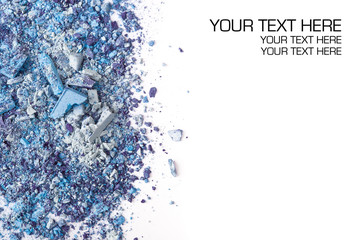 Crushed eyeshadows on white background