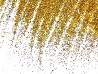 Golden glitter sparkle like a golden rain on white background