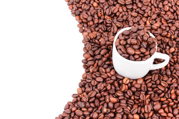 White cup with coffee beans