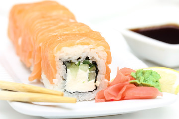 Sushi roll philadelphia with ginger and wasabi