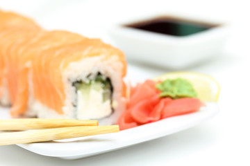 Sushi roll Alyaska  on white plate
