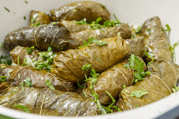 cooked dolma in pot and plate