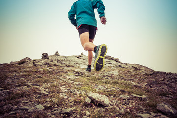Sky running on the Alps mountains trail