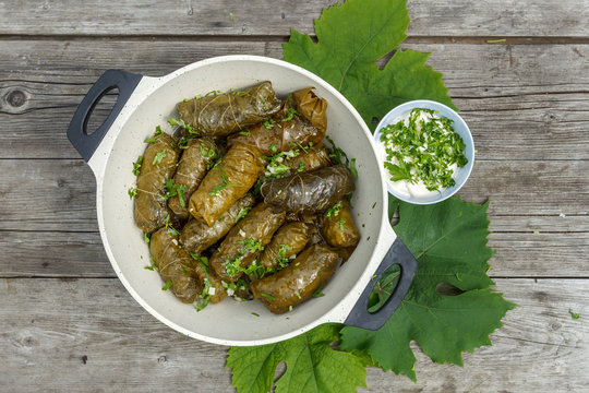 cooked dolma in pot and plate