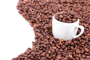 White cup with coffee beans