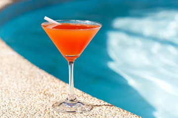 Cocktail Margarita with ice near swimming pool