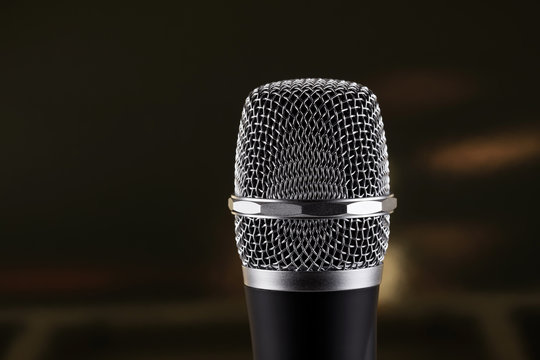 Wireless microphone on black background