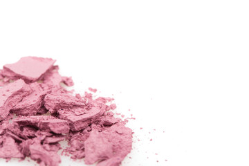 Crushed eyeshadows on white background