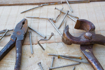 old  pliers, nails on a blackboard