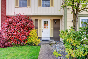 Perfect apartment entrance with white door.