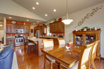 American traditional kitchen with glossy hardwood floor.
