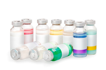 Group of the isolated vials with colored substances with clean labels