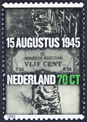 NETHERLANDS - CIRCA 1985: Dutch women in Japanese prison camp, Japnese occupation currency, building of the Burma Railway, circa 1985.
