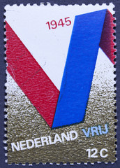 NETHERLANDS - CIRCA 1970: a stamp printed in the Netherlands shows V for Victory, 25th Anniversary of Liberation from the Germans, circa 1970 