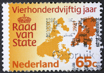 NETHERLANDS - CIRCA 1982: A stamp printed in the Netherlands shows image of Vierhonderdvijftig jaar, Raad van State (Country Map), circa 1982 