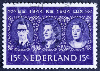 NETHERLANDS - CIRCA 1964: a stamp printed in the Netherlands shows King Baudouin, Queen Juliana and Grand Duchess Charlotte, Benelux, circa 1964 